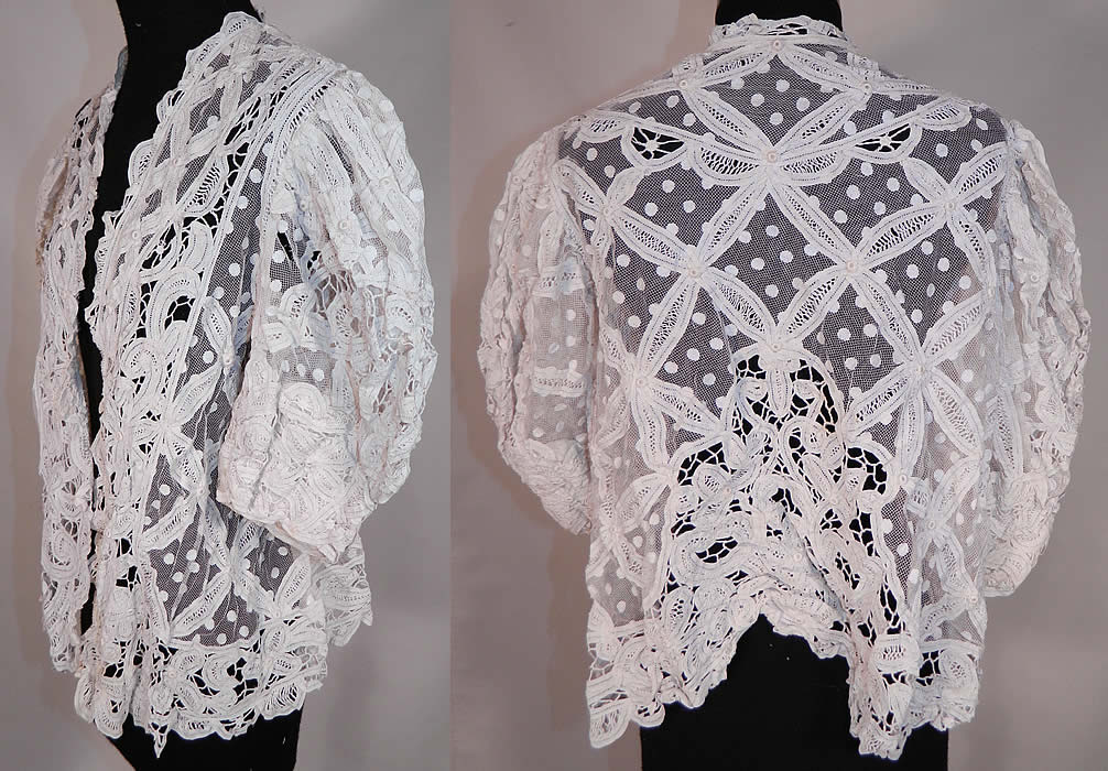 Vintage Edwardian Antique White Polka Dot Net Battenburg Crochet Tape Lace Blouse Jacket
This lovely lace blouse style jacket is loose fitting, with an open front, no closure, gathered shoulders, full puffy short sleeves, scalloped trim edging, a fitted shorter back and is sheer, completely unlined.