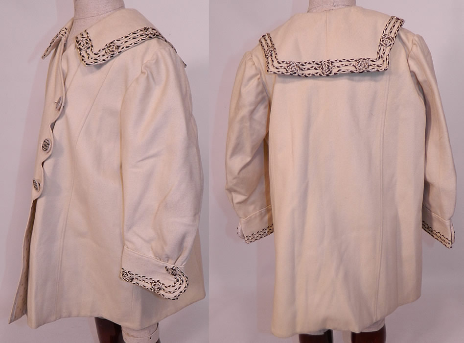 Edwardian White Wool Silver Soutache Braided Trim Childs Winter Coat
This charming child's wonderful winter traveling coat has a loose fitting, long full style, with a sailor style shawl collar, long sleeves with fitted trimmed cuffs, scalloped edge side front closure with 3 carved etched mother of pearl silver inlaid buttons and is fully lined in a polka dot white silk damask fabric inside.