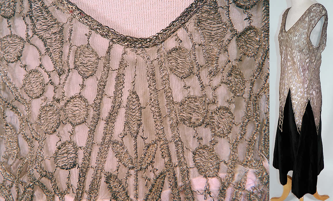 Vintage Silver Lam&eacute; Lame Lace Black Velvet Drop Waist Flapper Dress
The dress measures 42 inches long, with 38 inch hips, a 34 inch waist and 34 inch bust. It is in good condition, with only a small fray on the shoulder and some slight tarnish discoloration under the arms. This is truly a wonderful piece of wearable art!