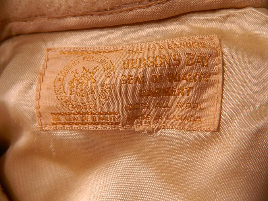 Vintage Hudsons Bay Point Wool 4 Stripe Blanket Coat Womens Jacket
There is a "This is a Genuine Hudson's Bay Seal of Quality Garment Made in Canada" label sewn inside. The coat measures 29 inches long, with a 40 inch waist, 40 inch chest, 15 inch back and 23 inch long sleeves. It is in excellent condition. This is truly a wonderful piece of wearable antique textile art! 