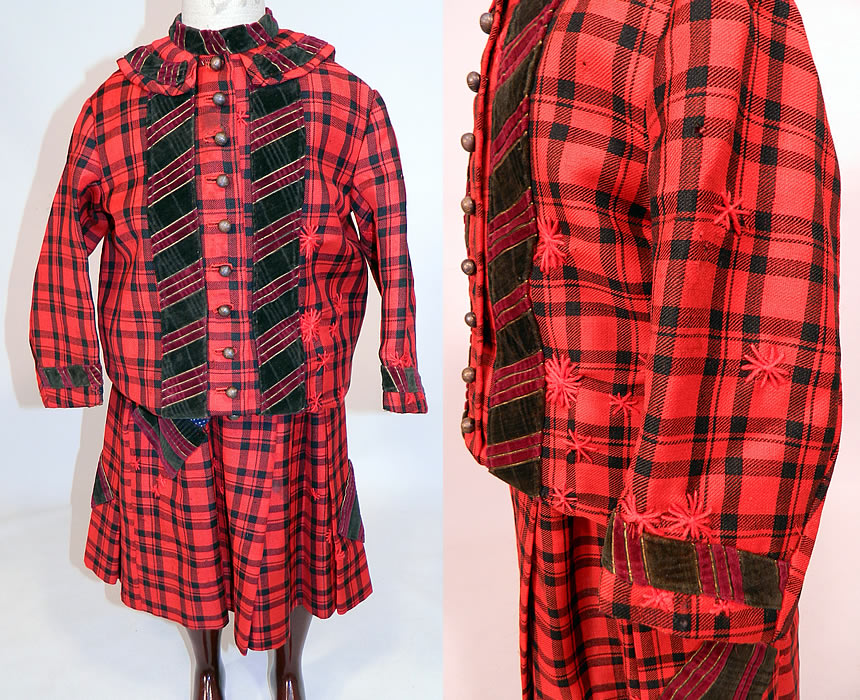 Victorian Childs Black & Red Tartan Plaid Wool Embroidered Patchwork 2 Piece Dress
This antique Victorian era child's black and red tartan plaid wool embroidered patchwork 2 piece dress dates from 1880. It is made of a black and red tartan plaid wool fabric, with decorative red embroidered sunburst stitching and striped velvet fabric trim edging and cut squares patchwork accents.