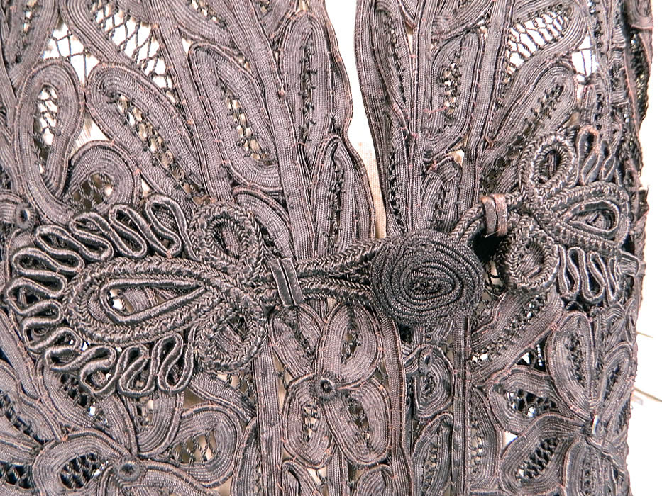 Edwardian La Samaritaine Brussels Black Silk Battenburg Tape Lace Long Coat Jacket
It is in good condition, with only some small frayed breaks in the connecting brides and mended repairs (see close-ups). This is truly an amazing, exceptional, quality made piece of wearable antique lace art! 