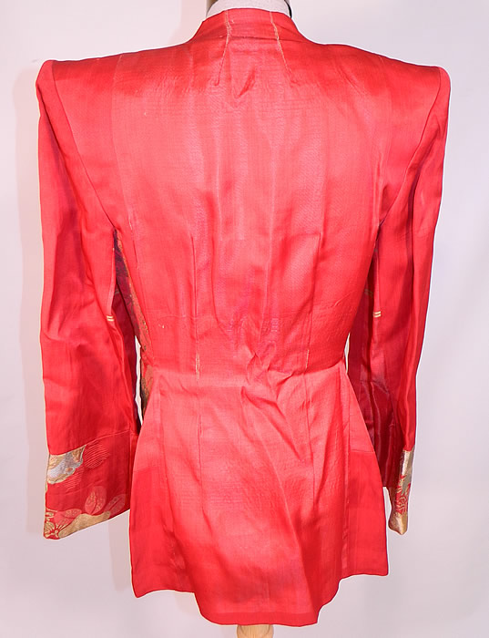 Vintage Japanese Kimono Obi Red Silk Gold Lame Broad Shoulder Jacket Lam&eacute;
The jacket measures 28 inches long, with 36 inch hips, a 26 inch waist, 34 inch bust, 15 inch back and 23 inch long sleeves. It is in good condition, with only a small frayed seam on the back. This is truly a wonderful piece of wearable Japanese textile art!