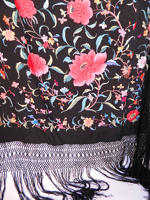 Vintage Antique Black Silk Pink Flower Vine Leaf Embroidered Canton Piano Shawl
There is a fabulous hand knotted macram&eacute; black silk fringe which measures 20 inches long surrounding the entire shawl with rounded corners. The shawls fabric square measures 63 by 63 inches. This quality made Manton Canton Chinese Cantonese made Spanish Flamenco Frida Kahlo boho style shawl is in excellent condition. This is truly a wonderful piece of wearable textile art! 