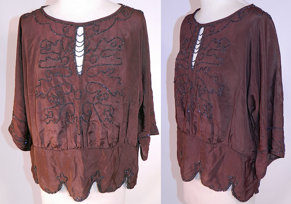 Vintage Art Deco Brown Silk Silver Beaded Flapper Blouse Shirt Top
This vintage Art Deco brown silk silver beaded flapper blouse shirt top dates from the 1920s. It is made of a brown silk crepe de chine fabric, with a charcoal color silver beading done in Art Deco abstract spiral scrolling designs.
