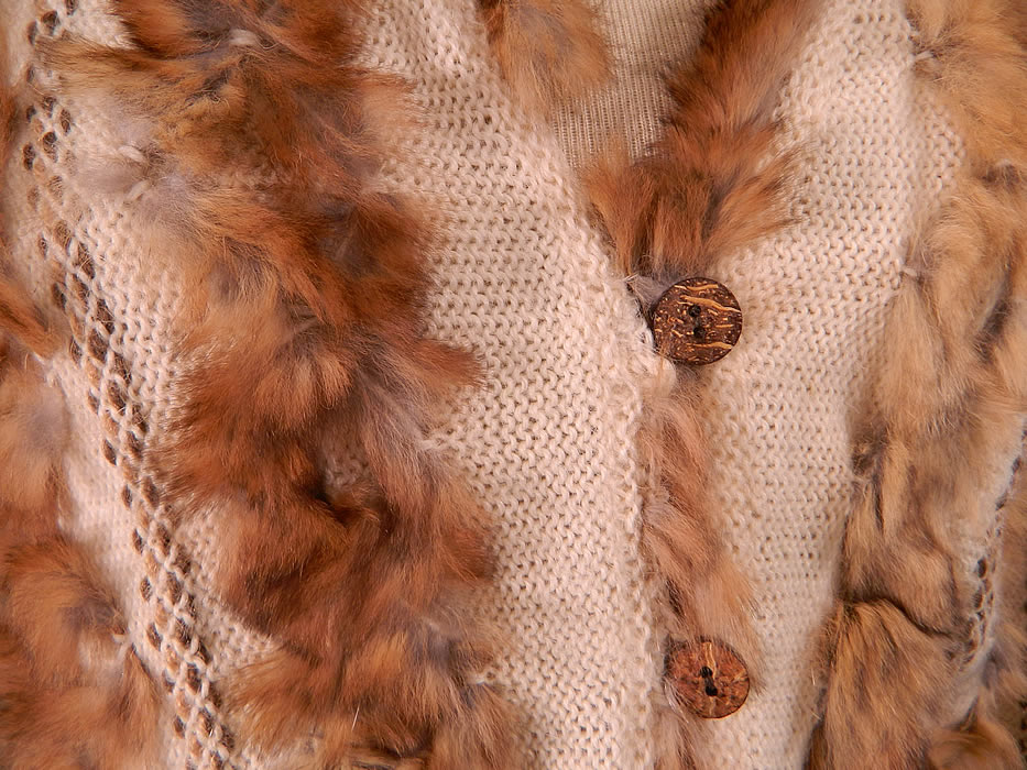Vintage Christian Dior Boutique Paris Designer Fur Knit Cardigan Sweater Jacket
This stunning couture designer cardigan style sweater jacket has coconut button closures down the front, a V front neckline, long sleeves and is unlined. There is a "Christian Dior Boutique Paris" designer label size Small tag sewn inside. 