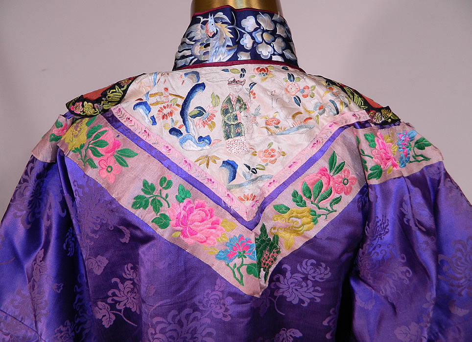 Antique Chinese Purple Silk Damask Floral Brocade Figural Embroidered Trim Robe
This is truly a wonderful piece of wearable antique Chinese art!