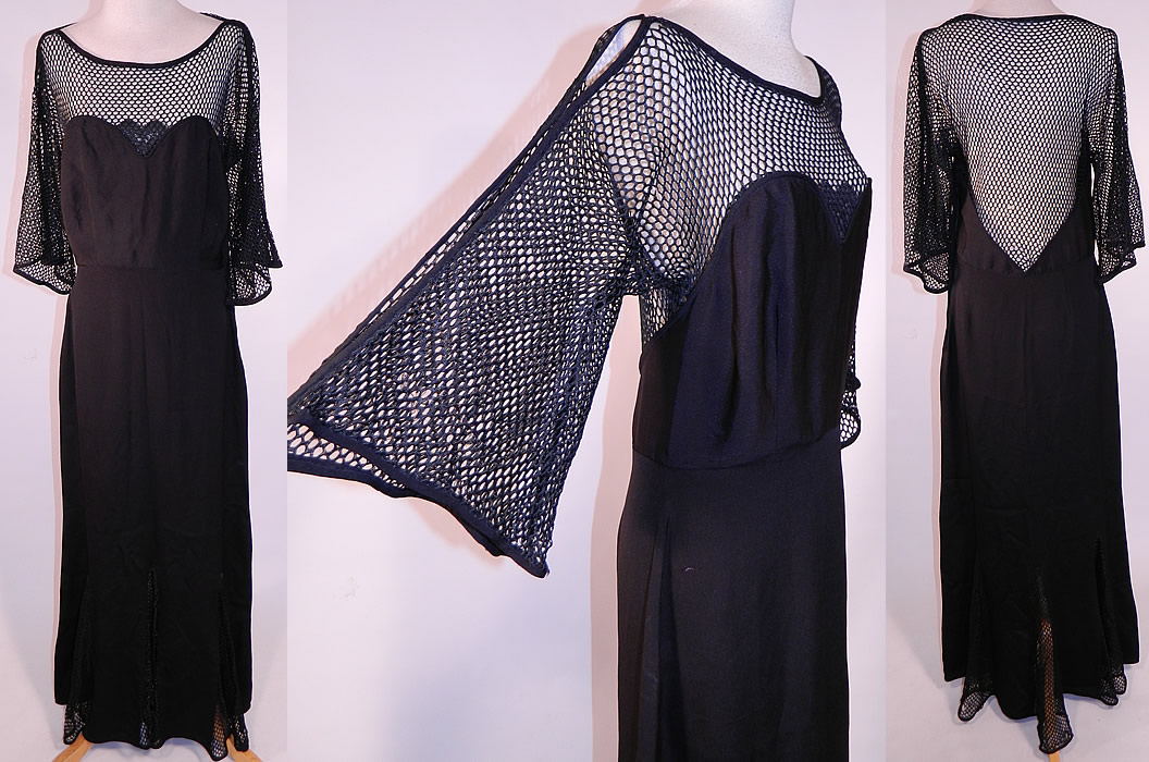 Vintage Black Silk Crepe Mesh Net Backless Gothic Evening Gown Dress
This vintage black silk crepe mesh net backless Gothic evening gown dress dates from the 1940s. It is made of a black silk crepe de chine fabric, with sheer silk mesh net sleeves, top and bottom skirt ruffle. This gorgeous Gothic gown has a sheer see through top, with scalloped sweetheart bustline, backless, long flared wide sleeves with peek-a-boo open slit shoulders, a long floor length skirt with mesh net flared ruffled inserts along the bottom and a side zipper closure.