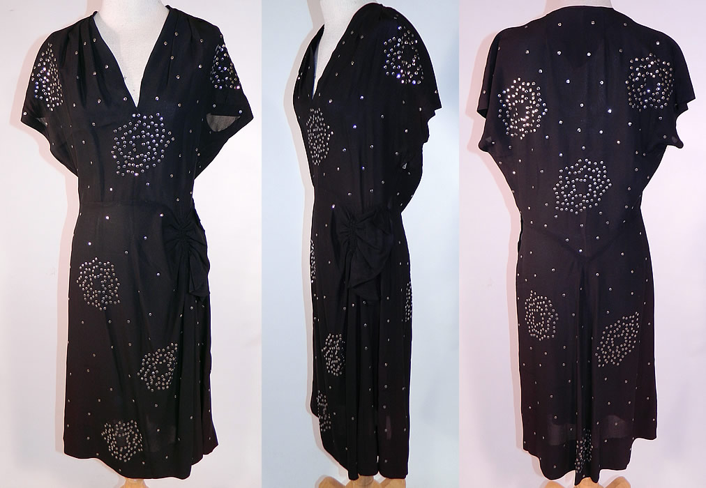 Vintage Black Silk Silver Metal Sequin Studded Beaded Cocktail Dress
This vintage black silk silver metal sequin studded beaded cocktail dress dates from the 1940s. It is made of a black silk knit jersey fabric, with silver metal sequins studded and beaded throughout in an abstract floral design.