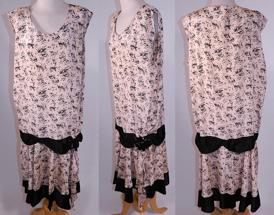 Vintage Black & White Goose Duck Novelty Print Silk Sleeveless Drop Waist Dress
This vintage black and white goose duck novelty print silk sleeveless drop waist dress dates from the 1920s. It is made of an off white silk crepe de chine fabric, with a black goose duck bird water fowl novelty print pattern design.