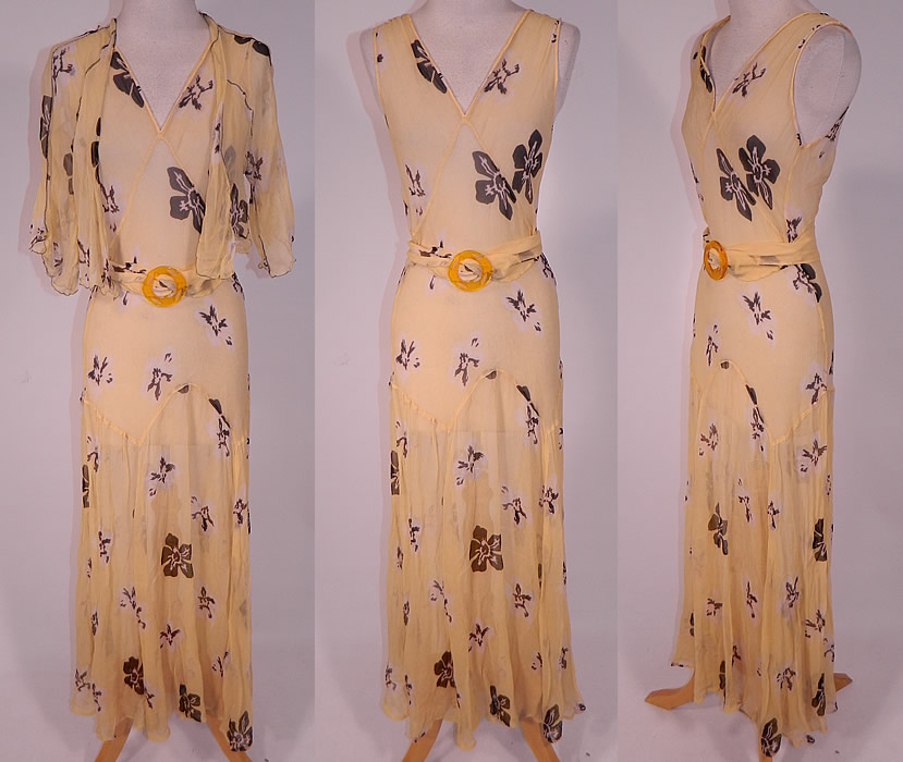 Vintage Yellow Silk Chiffon Black Floral Print Belted Bias Cut Dress & Jacket
This vintage yellow silk chiffon black floral print belted bias cut dress and jacket dates from the 1930s. It is made of a pastel yellow silk chiffon fabric, with a black and white floral poppy print pattern design. 
