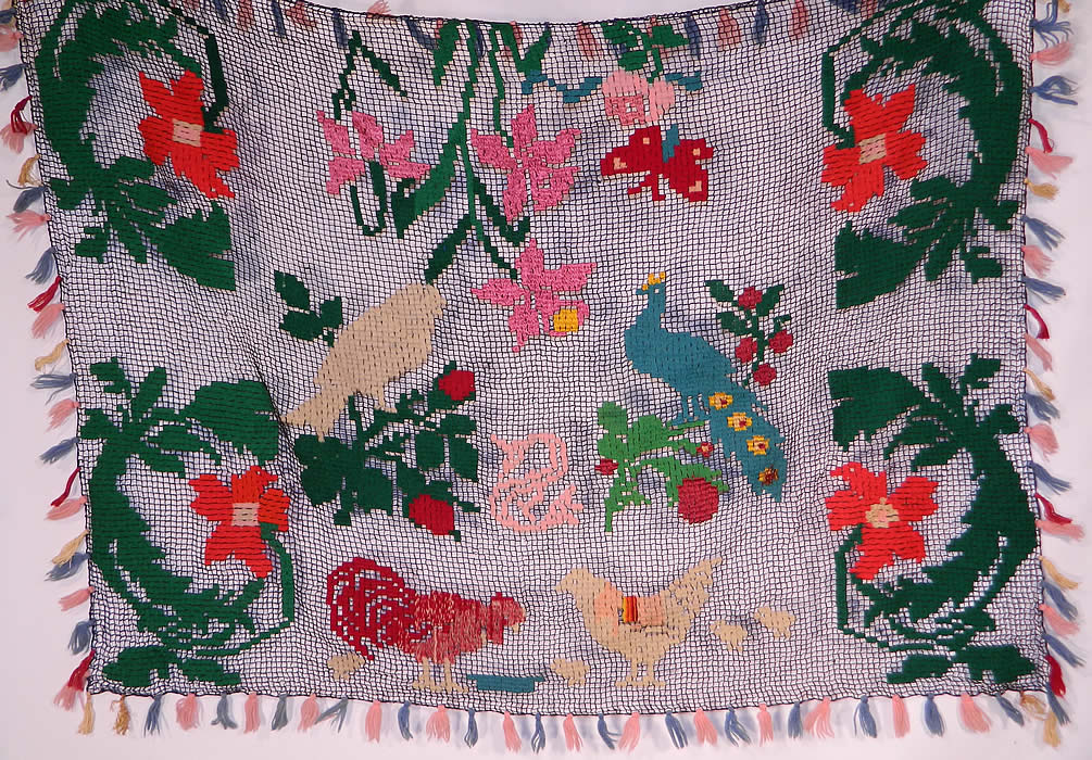 Vintage Colorful Ribbonwork Woven Crochet Fringe Floral Peacock Bird Boho Shawl
This vintage colorful ribbonwork woven crochet fringe floral peacock bird boho shawl dates from the 1920s.