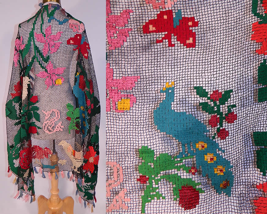 Vintage Colorful Ribbonwork Woven Crochet Fringe Floral Peacock Bird Boho Shawl
It is made of a sheer black crochet knit fabric, with colorful yarn woven ribbonwork designs of flowers, butterfly, birds, white hawk, peacock, rooster, chicken, chicks and hand knotted colorful fringe tassel trim edging. 