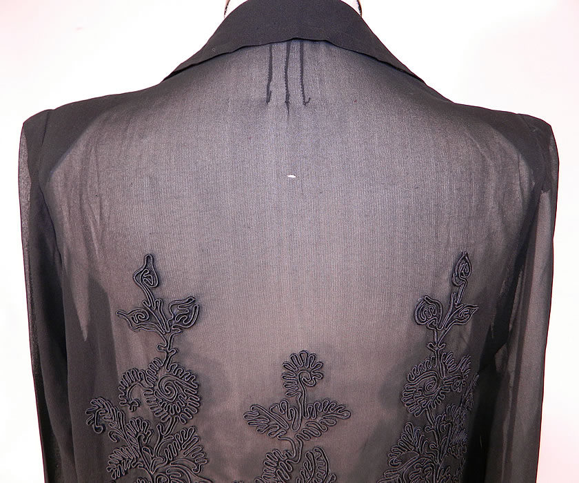Vintage Black Silk Soutache Embroidered Drop Waist Dress
The dress measures 43 inches long, with 36 inch hips, a 34 inch waist, 36 inch bust and 24 inch long sleeves. It is in good condition, with only a tiny pin hole on the back top (see close-up). This is truly a wonderful piece of Art Deco wearable textile art! 