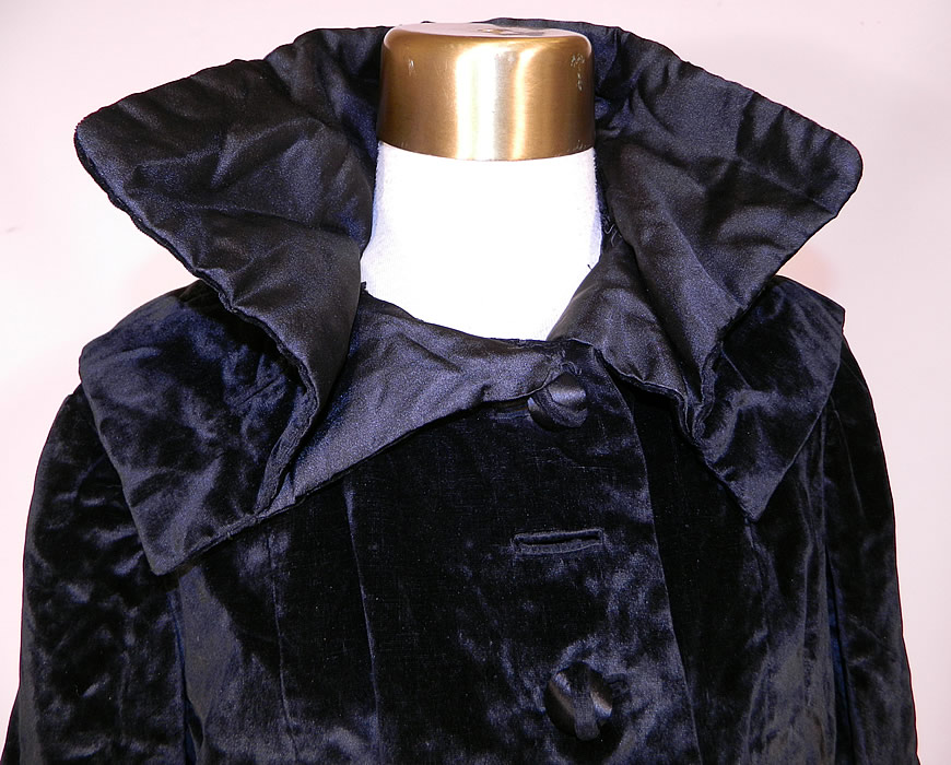 Edwardian Black Velvet Womens Winter Equestrian Tailored Tail Coat Riding Jacket
This exquisite equestrian womens winter riding coat has a short cropped front, with a draping long coattails back, a fitted back, a shawl collar which can be worn turned up or down, long full sleeves with wide gathered cuffs, silk button closures on the front and is fully lined.