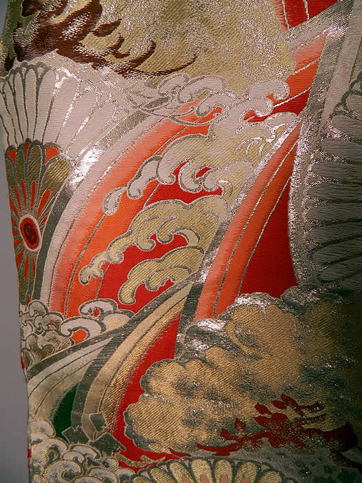 Vintage Japanese Gold Silk Lam&eacute; Lame Ocean Waves Obi Fabric Sleeveless Vest Jacket
The coat measures 44 inches long, with 44 inch hips, a 44 inch waist and 44 inch bust. It is in excellent condition. This is truly a wonderful piece of wearable Japanese textile art! 