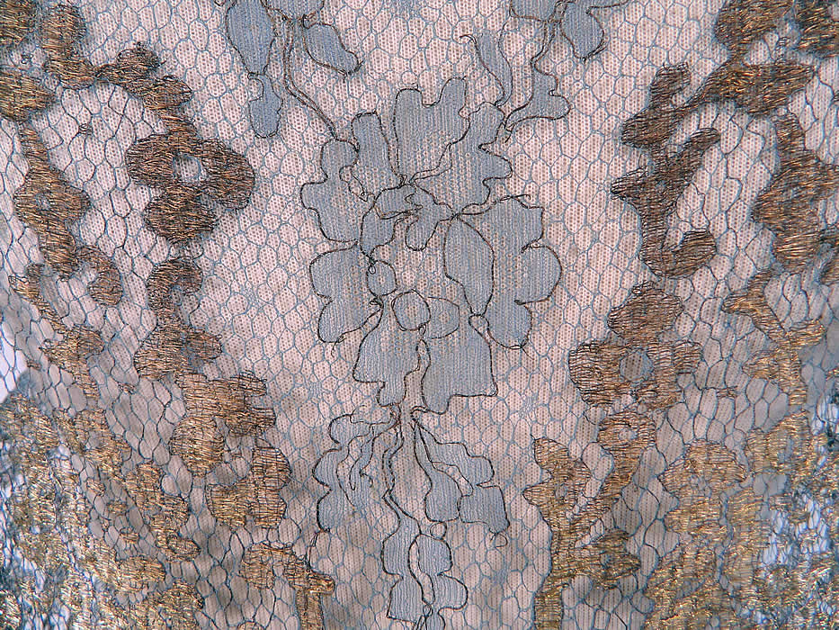Art Deco Blue Net Gold Lam&eacute; Lame Lace Handkerchief Skirt Drop Waist Flapper Dress
The dress measures 46 inches long, with 8 inch longer sides, 40 inch hips, a 36 inch waist and 36 inch bust. It is in excellent condition. This is truly a rare blue color and wonderful piece of Art Deco wearable textile art! 