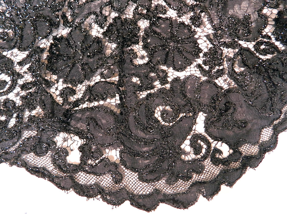 Nan Merriman Opera Singer Vintage Black Lace Silver Glitter Soutache Evening Gown
The dress is a large size measuring 61 inches long in the front and 71 inches long in the back, with 40 inch hips, a 30 inch waist and 38 inch bust. 