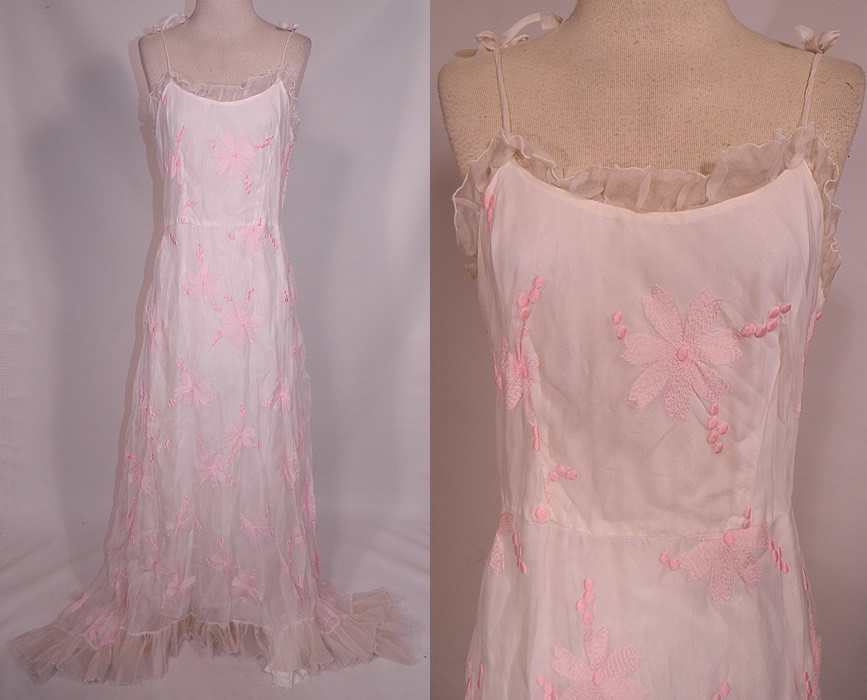 Vintage White Organdy Pink Embroidered Flower Formal Gown Skirt Train Dress
This vintage white organdy pink embroidered flower formal gown skirt train dress dates from the 1940s. It is made of a white sheer organdy fabric, with pink pastel daisy flower embroidery work designs. 