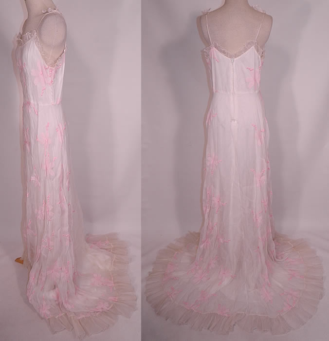 Vintage White Organdy Pink Embroidered Flower Formal Gown Skirt Train Dress
This fabulous formal floor length long gown has adjustable tie shoulder spaghetti straps, a ruffle trim neckline, full skirt with slight back train ruffle hemline, back zipper closure and is fully lined.