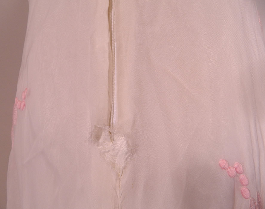 Vintage White Organdy Pink Embroidered Flower Formal Gown Skirt Train Dress
It is in good condition, with only a small frayed hole on the bottom back zipper seam (see close-up). This is truly a wonderful piece of wearable art!