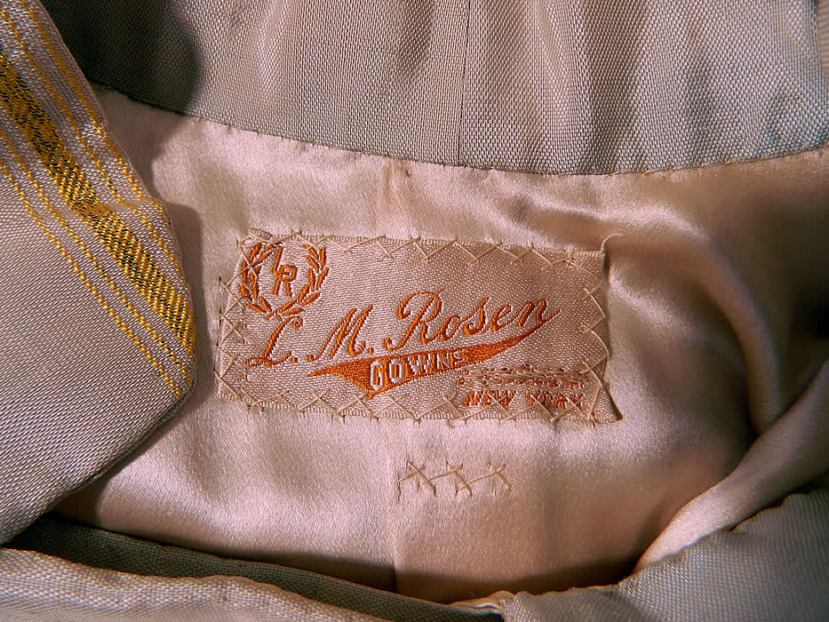 Vintage L.M. Rosen Gowns NY Label Art Deco Gold Lame Blue Silk Evening Coat Lam&eacute;
There is an "L.M. Rosen Gowns New York" designer label sewn inside.