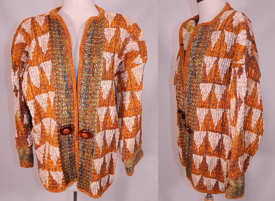 Vintage Pashtun Pakistan Swat Valley Embroidered Textile Tucks Gathering Coat
This vintage Pashtun Pakistan Swat Valley ethnic embroidered textile tucks gathering coat dates from the 1980s. It is made of an antique late 19th century brown linen fabric, with orange and cream color silk embroidery work done in an abstract ethnic inspired triangle design. 
