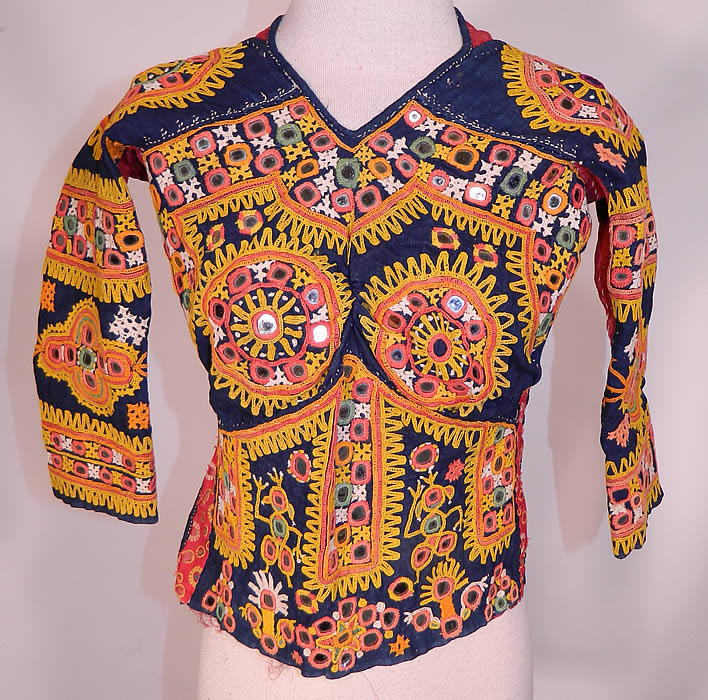 Vintage Antique Indian Gujarati Kutch Work Embroidered Mirror Choli Boho Blouse Top
This vintage antique Indian Gujarati kutch work colorful embroidered mirror choli boho blouse top dates from the early 1900s.
