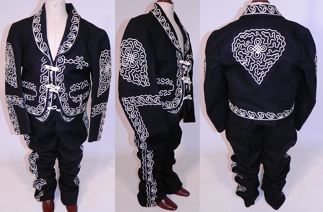 Vintage Childs Mariachi Charro Costume Suit Soutache Black White Wool Jacket Pants
This vintage child's mariachi charro costume suit soutache black and white wool jacket and pants date from the 1950s. It is made of a black wool fabric, with white soutache embroidery work trim creating decorative spiral scrolling interlocking designs.