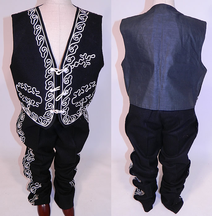 Vintage Childs Mariachi Charro Costume Suit Soutache Black White Wool Jacket Pants
This magnificent Mexican mariachi child's charro costume includes a bolero cropped jacket, with a rounded fold over collar, long full sleeves, two front pockets, white button toggle loop closures and is fully lined. The jacket measures 15 inches long, with a 26 inch waist, 28 inch chest, 11 inch back shoulder and 17 inch long sleeves.