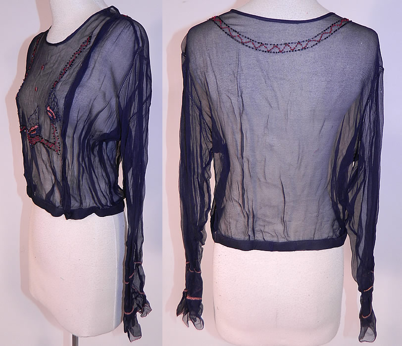 Vintage Navy Blue Sheer Silk Chiffon Embroidered Beaded Butterfly Blouse Shirt
It is in good condition. This is truly a wonderful piece of wearable Art Deco textile art!