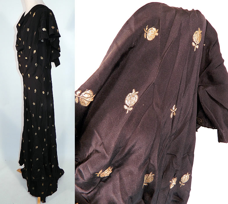 Vintage Black Silk Gold Lam&eacute; Lame Pomegranate Bias Cut Evening Gown Dress
This beautiful bias cut evening gown dress is a long floor length with a tired layered slight back train skirt, weighted drape front neckline, plunging V back, short flared cap sleeves, snap closures and is unlined. 