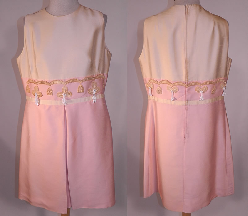 Vintage Haute Couture Athens Label Pink Raw Silk Beaded Lace Trim Dress & Jacket
The jacket measures 20 inches long, with a 38 inch waist and 40 inch bust. There is a matching fabric embellished sleeveless shift style cocktail mini dress, with a short pleated front skirt, back zipper closure and is fully lined. 