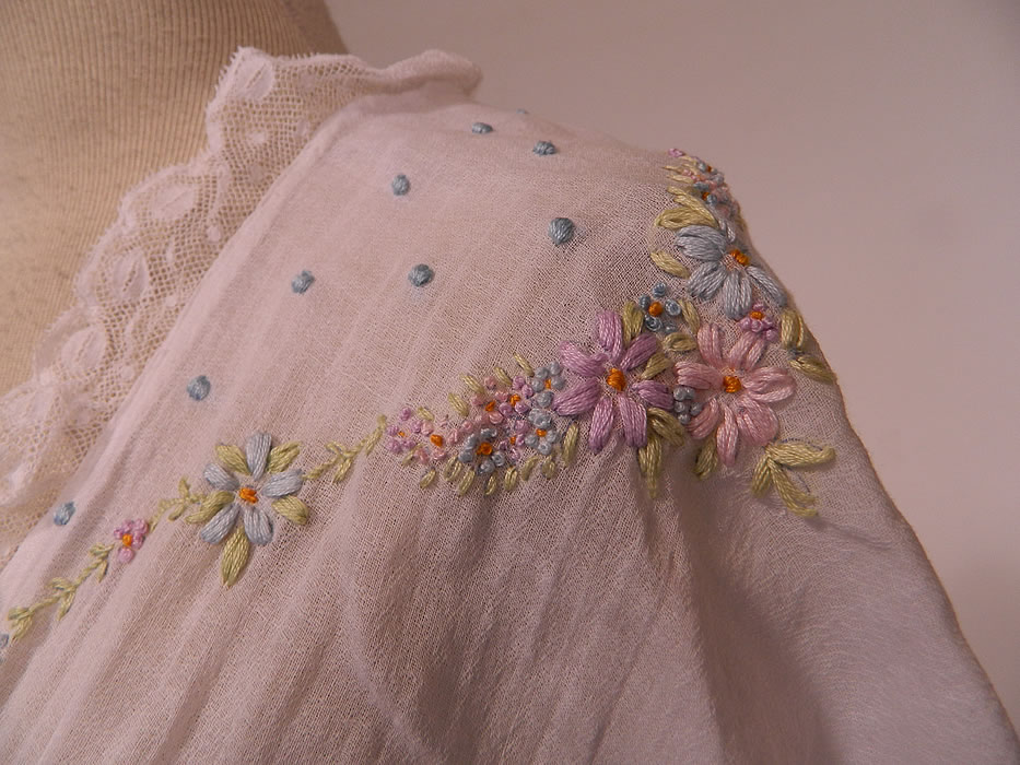 Edwardian Titanic White Cotton Rosette Embroidered Lace Peignoir Dressing Gown Robe
The robe measures 58 inches long, with 60 inch hips, a 60 inch waist and 48 inch bust.