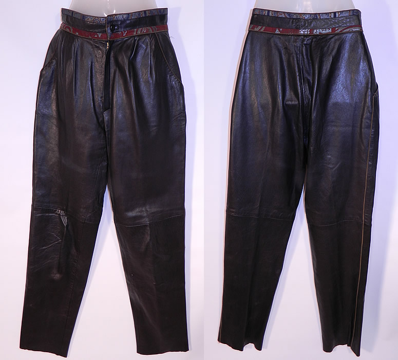 Vintage Roberto Cavalli Designer Paisley Trim Black Leather Pants Italy
This vintage Roberto Cavalli designer paisley trim black leather pants date from the 1970s. It is made of a 100% leather black, with a colorful paisley print leather trim edging around the waist creating a faux belt style.