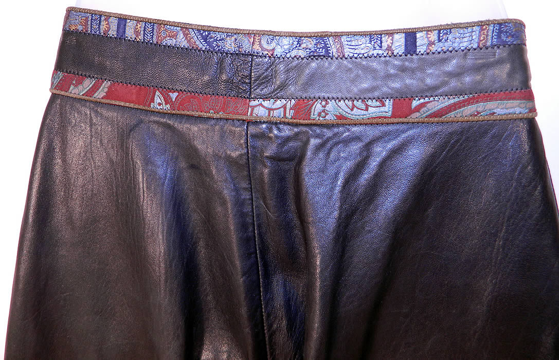 Vintage Roberto Cavalli Designer Paisley Trim Black Leather Pants Italy
The pants measure 42 inches long, with a 30 inch inseam, 42 inch hips and 28 inch waist. 
