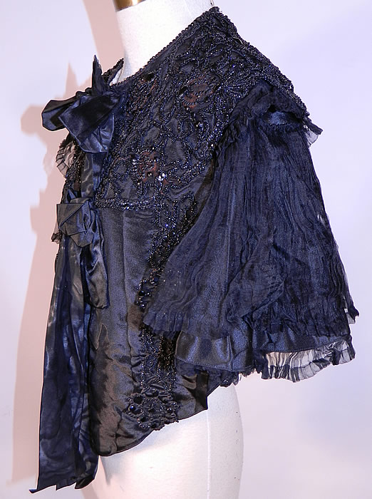 Victorian Black Silk Jet Beaded Mourning Mantle Dolman Cloak Cape Capelet
The cape measures 19 inches long, with a 36 inch bust. 