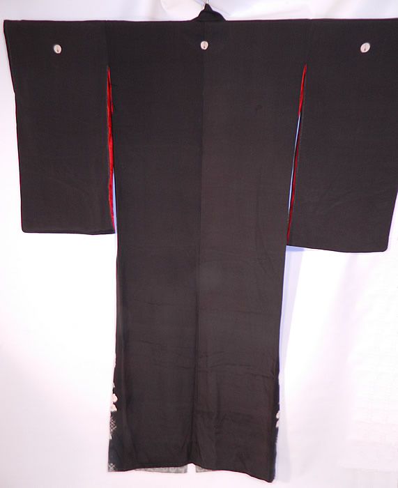 Vintage Japanese Geisha Formal Family Crest Mon Black Silk Screen Floral Kimono
The kimono measures 62 inches long, with 27 inch long kimono sleeves and is 25 inches across the shoulders. It is in good condition, with only a small rip along the seam of the bottom inside lining. This is truly a wonderful piece of wearable Japanese textile art!
