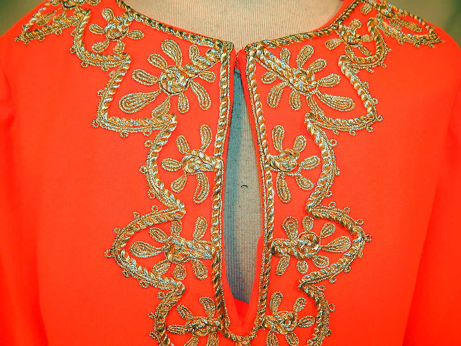 Vintage Perfect Lord & Taylor Label Orange Gold Trim Kaftan Boho Maxi Dress
This vintage Perfect Lord & Taylor label orange, gold trim kaftan boho maxi dress dates from the 1960s. It is made of a bright orange wool fabric, with decorative gold metallic braided rope soutache trim edging the neckline and sleeve cuffs. 