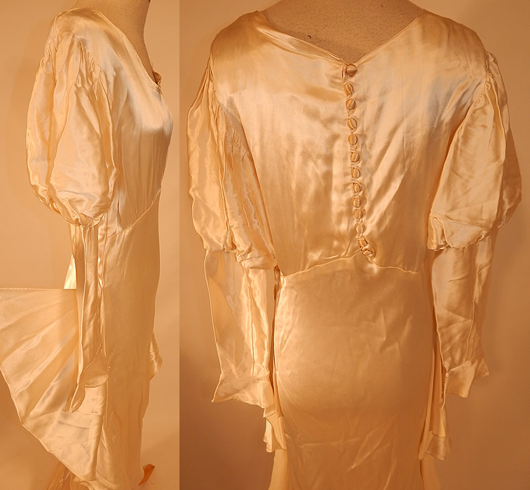 Vintage White Silk Satin Bias Cut Wedding Gown Dress Long Train Skirt
It is in good condition, but has not been cleaned, with a few faint small stains on the front top and has snaps inside the neckline. This is truly an amazing piece of wearable wedding bridal art!