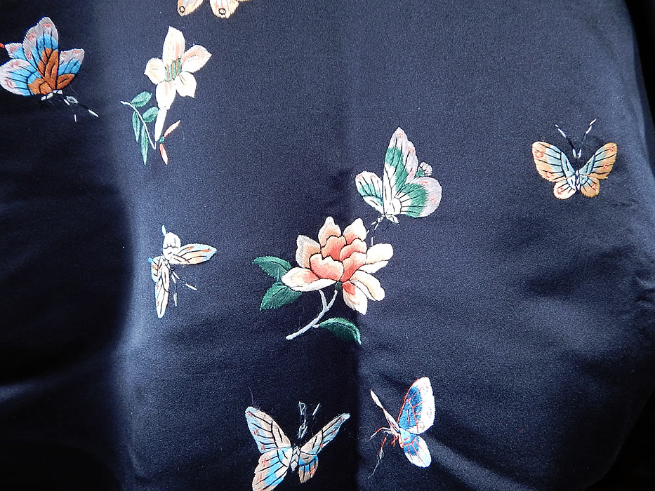 Vintage Chinese Black Silk Pastel Embroidered Butterfly Belted Kimono Robe
The robe measures 52 inches long, with 50 inch hips, a 50 inch waist and chest. It is in excellent condition and appears to have never been work. This is truly a wonderful piece of wearable Chinese textile art!