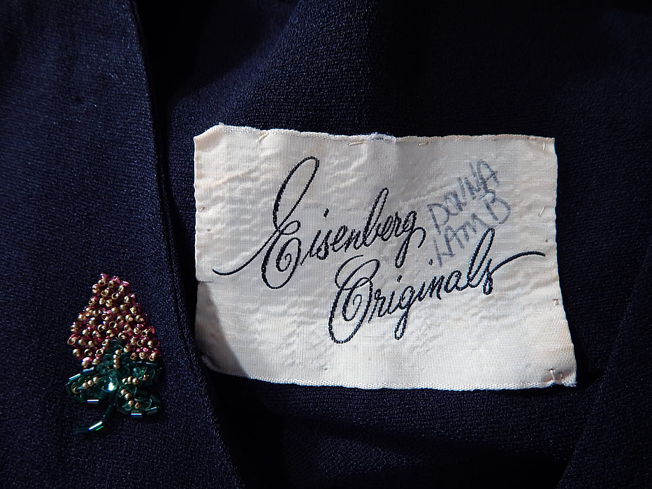 Vintage Eisenberg Originals Black Silk Crepe Strawberry Beaded Cocktail Dress
The dress is a large size measuring 51 inches long, with 36 inch hips, a 30 inch waist and 36 inch bust. It is in good condition, with only the name of the original owner hand written in ink on the inside label. This is truly a rare and wonderful piece of designer wearable art!