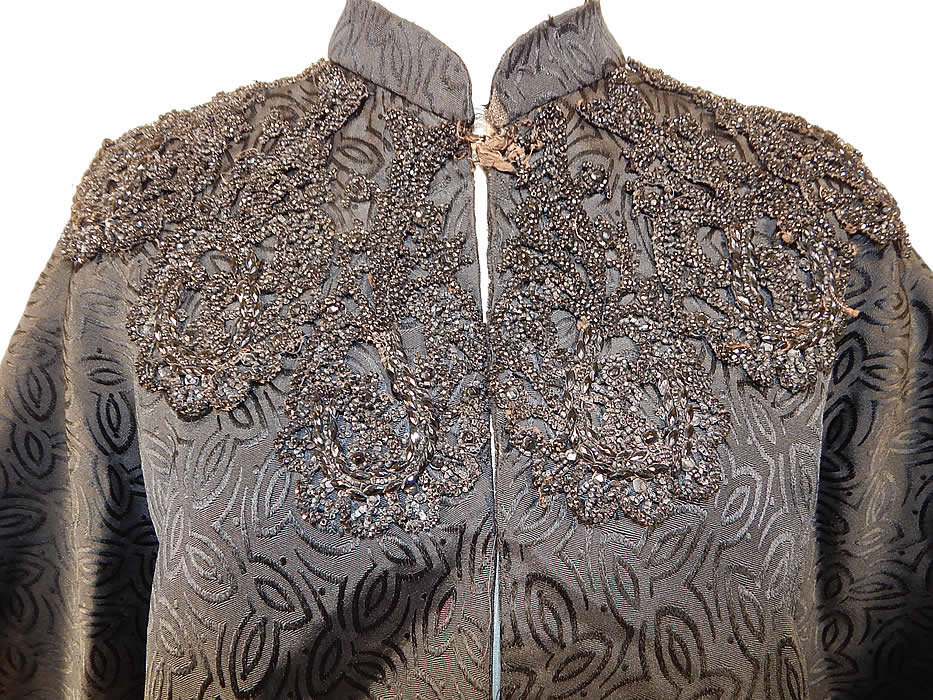 Victorian Black Silk Damask Brocade Jet Beaded Trim Mourning Cloak Cape
It is in good, with only some fraying along the collar and some missing loose beadwork in areas (see close-up). This is truly a wonderful piece of antique Victoriana mourning wearable art!