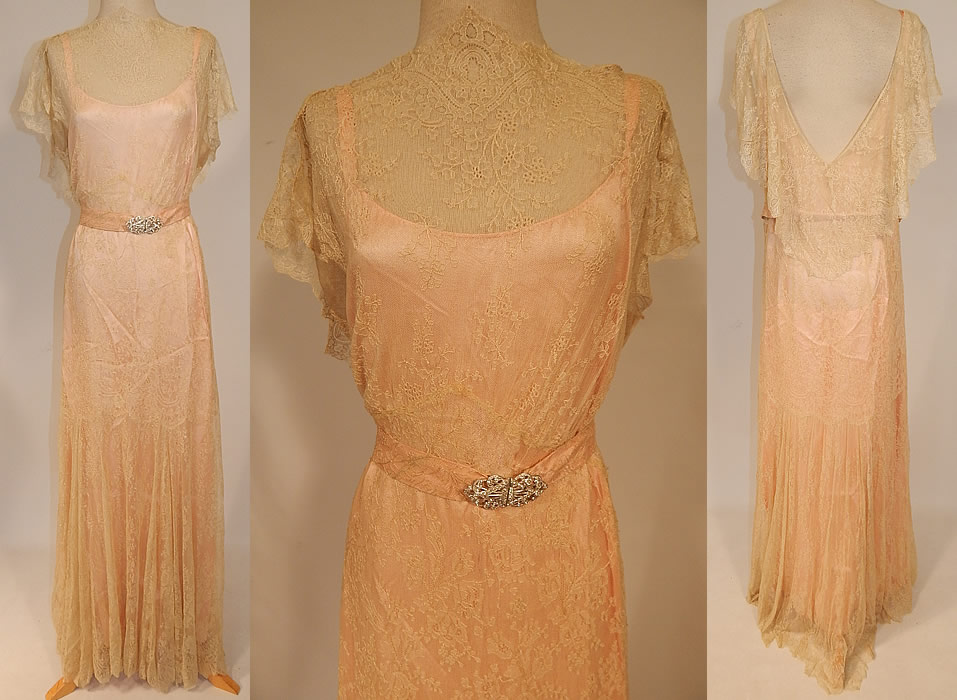 Vintage Cream Chantilly Lace Belted Bias Cut Dress Wedding Gown & Pink Silk Slip
This vintage cream chantilly lace belted bias cut dress wedding gown and pink silk slip dates from the 1930s. It is made of an off white cream color delicate fine sheer silk chantilly lace net fabric, with a floral vine leaf pattern design.