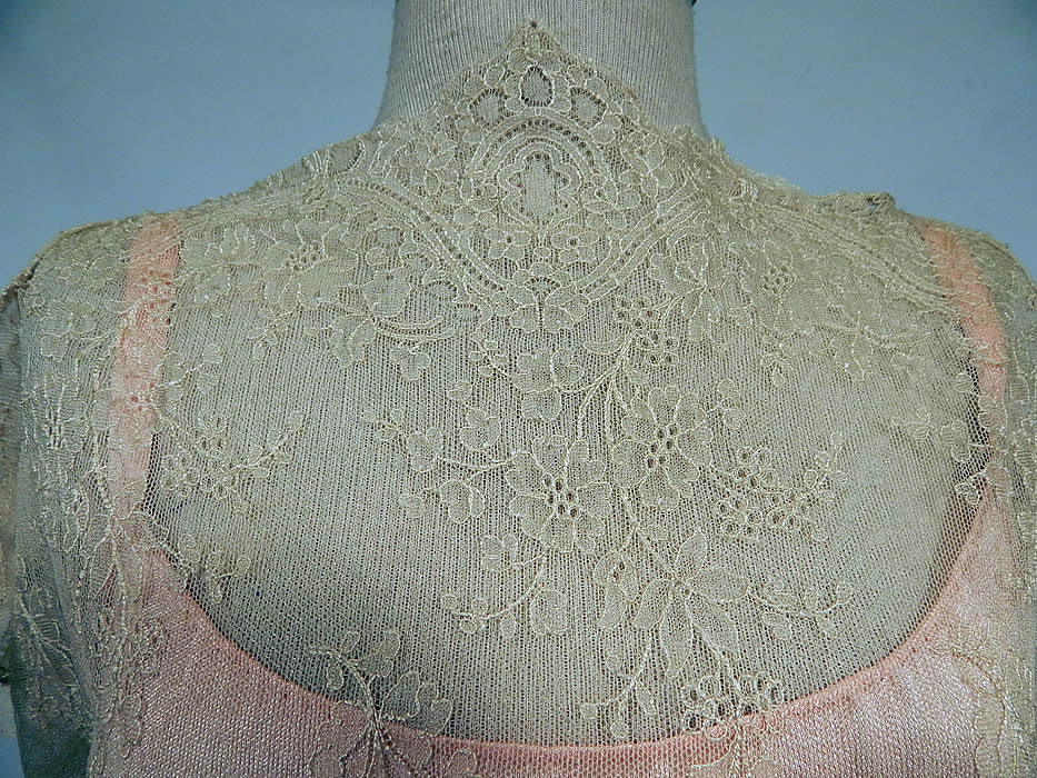 Vintage Cream Chantilly Lace Belted Bias Cut Dress Wedding Gown & Pink Silk Slip
The dress measures 60 inches long, with 36 inch hips, a 30 inch waist and 38 inch bust. Included is a pink pastel silk full slip underneath.