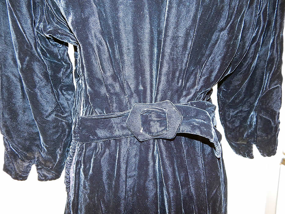 Vintage Black Silk Velvet Cream Lace Yoke Belted Back Cocktail Dress
The dress measures 41 inches long, with 40 inch hips, a 34 inch adjustable waist, 40 inch bust and 15 inch back. It is in good condition. This is truly a wonderful piece of wearable textile art!
