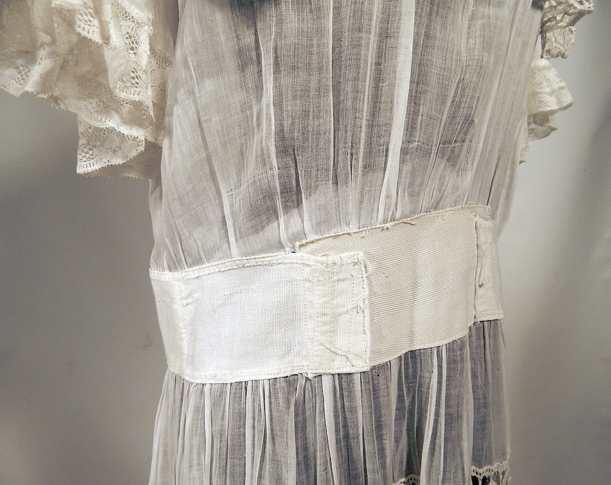 Edwardian White Cotton Batiste Bobbin Lace Belted Graduation Wedding Dress
This is truly a wonderful piece of antique lace textile art which could be worn as a wedding gown or graduation dress!