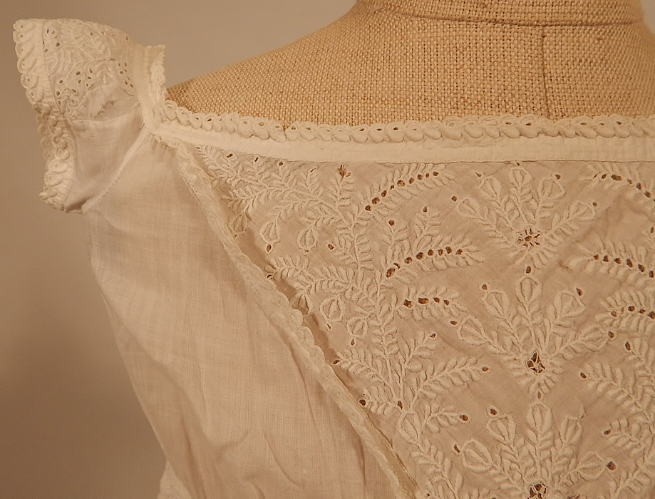 Victorian Antique Ayrshire Whitework Cotton Batiste Christening Gown Infant Dress
This beautiful baby infant christening gown dress has a high empire waist, a squared drawstring neckline, open back, short cap sleeves, a long full skirt and is unlined.
