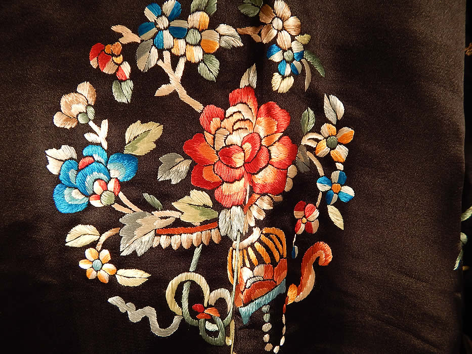 Antique Chinese Black Silk Embroidered Peony Flower Butterfly Robe & Camisole
This stunning short surcoat style robe jacket is a mid length, with long full sleeves, colorful silk damask brocade trim edging, black button toggle closures down the front and is fully lined in a black silk damask floral pattern brocade fabric inside. 