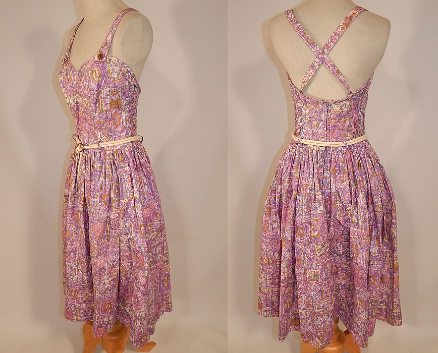 Vintage Catalina Sportswear Pink Cotton Novelty Print Belted Circle Skirt Dress
his retro summer sundress has adjustable button shoulder straps criss crossing on the back, a sweetheart neckline, with built in shelf bra top lining, white cord rope gold metal buckle belt, full circle skirt, with an elastic ruched smocking back and zipper closure.